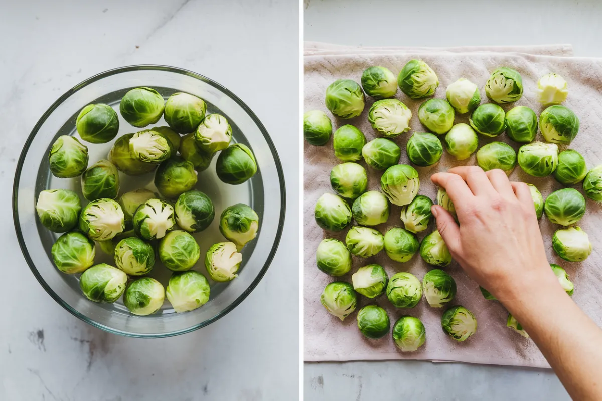 A bowl of Brussels sprouts soaking in water with a sprinkle of salt.